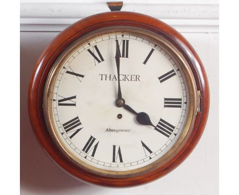 A Victorian mahogany circular dial wall clock, the white enamel dial (restored) signed Thacker of Abergavenny, single winding