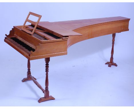 A cedar kit-built harpsichord, in the 18th century Italian style, having one keyboard and two registers, w.84cm, d.212cm, h.8