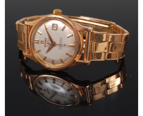 A gents 18ct rose gold Omega Constellation chronometer bracelet watch, having signed champagne dial with baton markers, date 