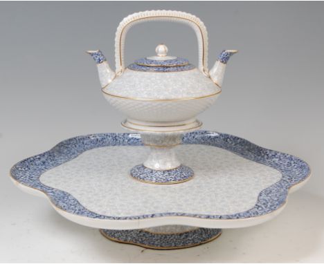 A late Victorian Worcester lazy-susan, with double spouted teapot, the teapot with basket weave moulding and decorated in blu