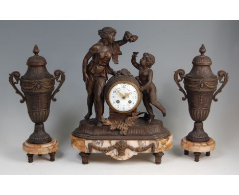 A circa 1900 bronze metal and marble three piece clock garniture, by R. Jay of Paris and London, the clock modelled as Hebe t