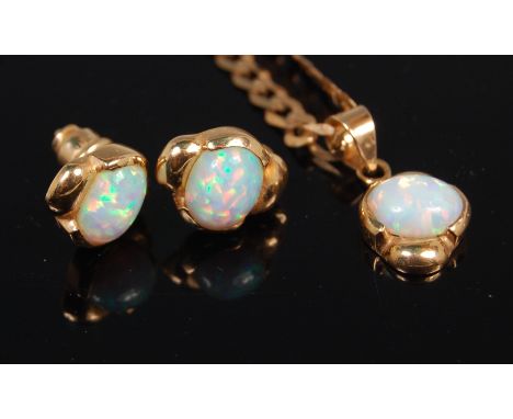 A 14ct gold flat curblink necklace with opal set pendant and matching pair of cabochon opal set ear studs, gross weight 11.4g