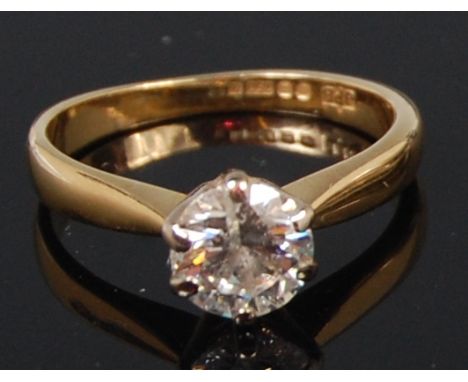 A modern ladies 18ct gold diamond solitaire ring, the claw set brilliant weighing approx 0.95ct, size K  Condition Report / E