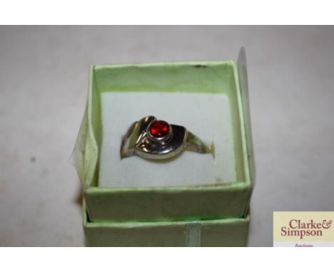 A 925 and red stone set ring 