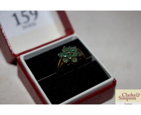 A 9ct gold green stone set cluster ring