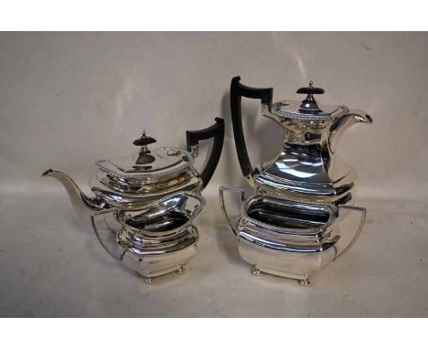 An early 20th century Silver four-piece Tea Service by Walker and Hall, Sheffield 1926, bow sided rectangular form with gadro