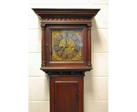 J. Graves of London, an 18th century oak Longcase Clock, flat top moulded cornice, above a glazed door between a pair of turn