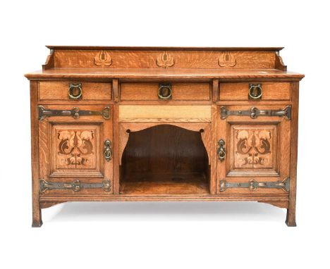 An Arts & Crafts Shapland & Petter of Barnstaple Inlaid Oak Sideboard, with raised upstand, above three drawers, above two do