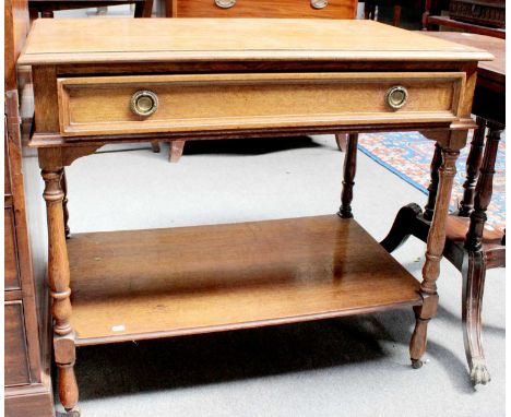 A Late Victorian Oak Side Table, fitted with a drawer and shelf stretcher, 91cm by 55cm by 80cm