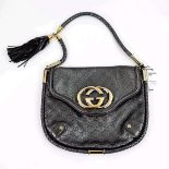 GUCCI BRITT SILVER GUCCISSIMA LEATHER TASSEL BAG.