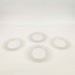 A SET OF FOUR LALIQUE GLASS PLATES.