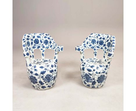 A PAIR OF CHINESE GARDEN SEATS. blue and white ceramic,64cm H x 46cm W dx 39cm D.