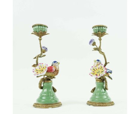 A PAIR OF BIRD CANDLESTICKS. ceramic and gilt metal, 30cm H.