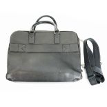 LOUIS VUITTON TAIGA NEO LEATHER TRAVEL BAG.