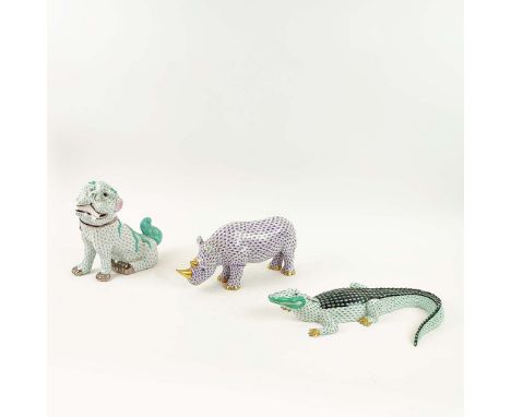 A COLLECTION OF LARGE HEREND PORCELAIN ANIMALS (3). to include a crocodile 40cm L, a dog of foo 25cm H and a rhino 33cm L.