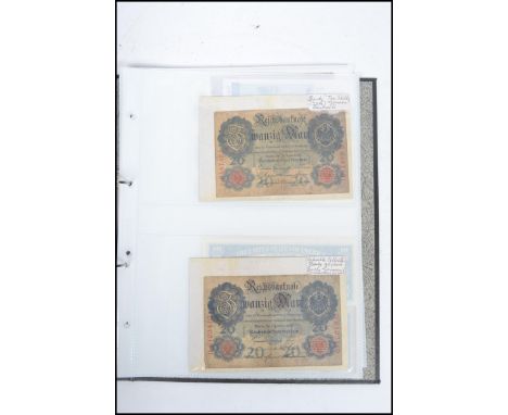 A collection of vintage banknotes include early German Reichsbanknote 10 shillings 20 Marks, Bank Of Canada one dollar, USA s