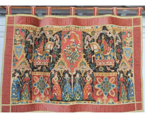 A wall hanging tapestry banner depicting depicting Medieval subjects and scenes hung from a wooden pole with finial ends.&nbs
