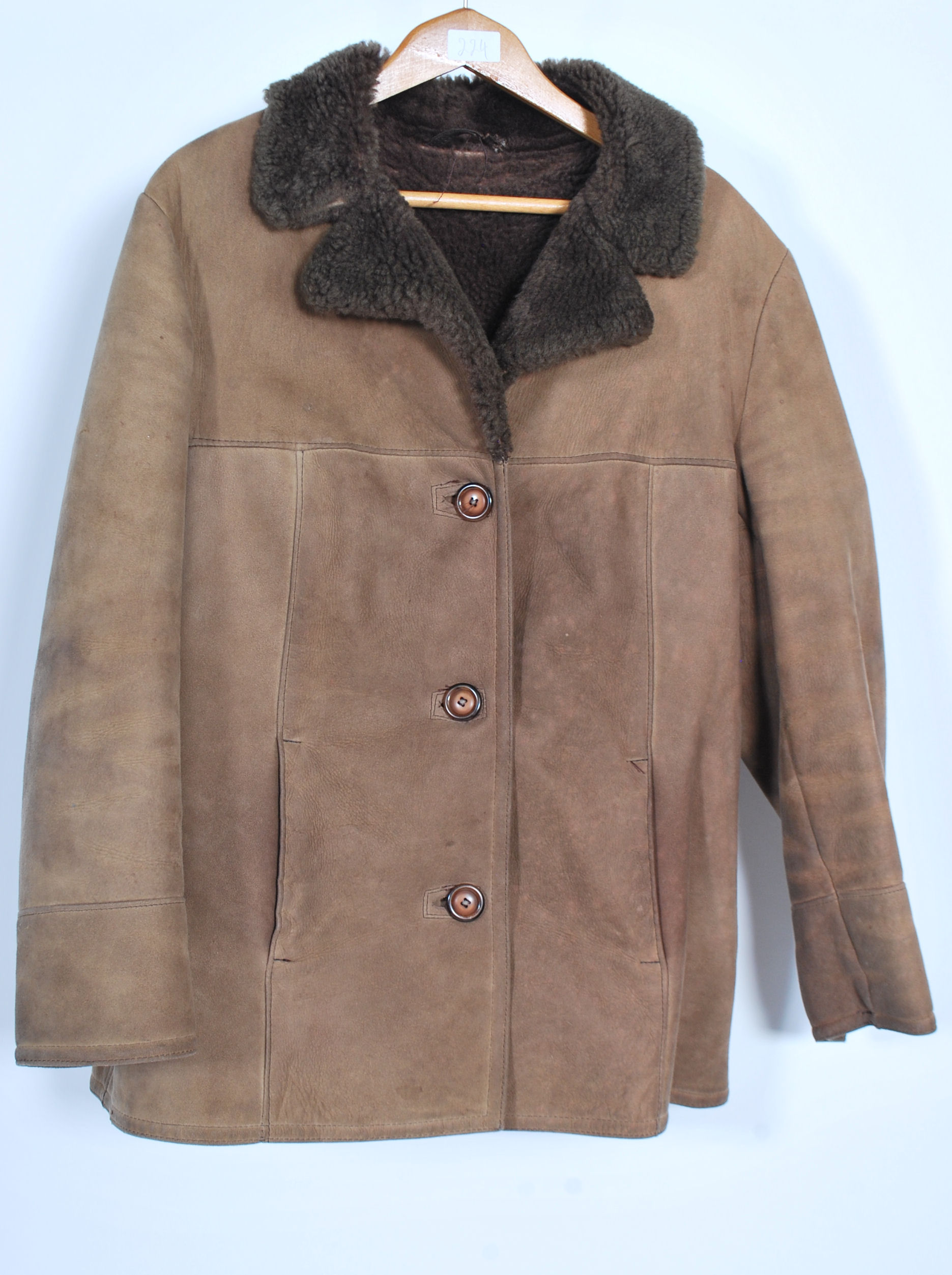 A vintage 20th century gents and ladies three quarter length sheepskin ...