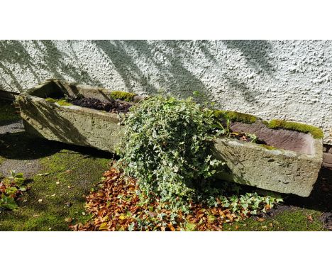 A large antique 19th century long 7ft natural stone trough of rectangular shaped form being hewn hand carved being well weath