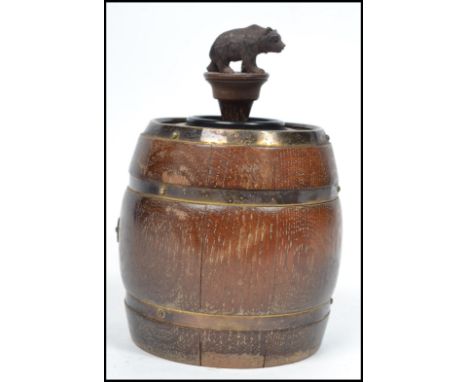 An unusual mid century Dorset Light Industries barrel and bear table lighter.&nbsp; Oak barrel with bakelite battery inners h