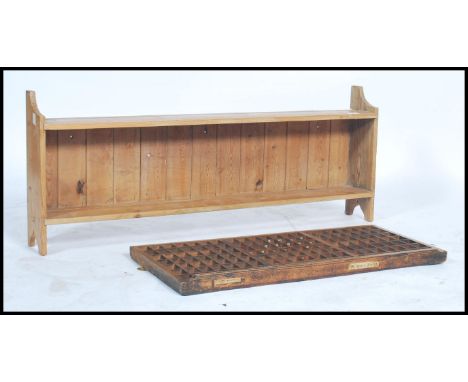 A vintage Industrial 20th century pine seed tray together with a country pine hanging shelf of wide form. Measures 45cms by 1