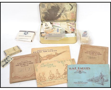 A large collection of vintage 20th century cigarette cards, several loose together&nbsp; with many albums please refer to ima