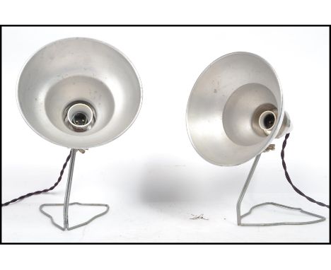 A pair of vintage retro 20th century Photax photographic lamps being converted to desk lamps raised on wire bases with chrome