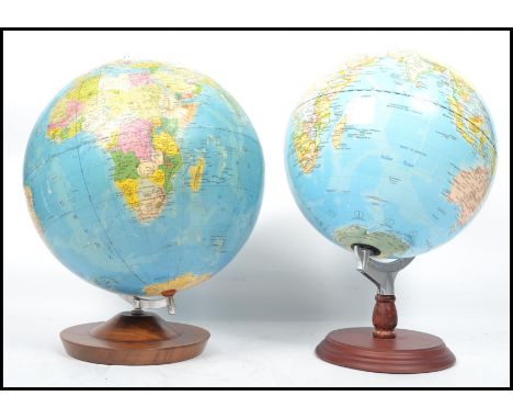 A vintage 20th century retro 1980's Political desk top globe on circular base along with another of similar form.