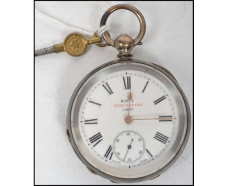 A vintage 20th century Kays Perfection Lever silver pocket watch having a white enamel face with roman numeral chapter ring a