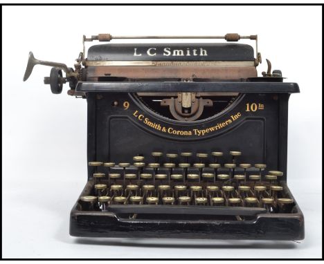 A vintage early 20th century L. C Smith &amp; Corona Super Speed typewriter, retaining original decals.