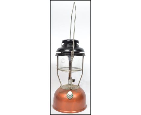 A vintage 20th century boxed Tilley Stormlight X246B paraffin pressure oil lamp within original box. Measures 53 cm high.