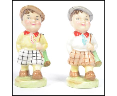 Two vintage 20th century ceramic novelty golfing figures by Artone entitled the 19th hole in varying colourways. Measures 11 