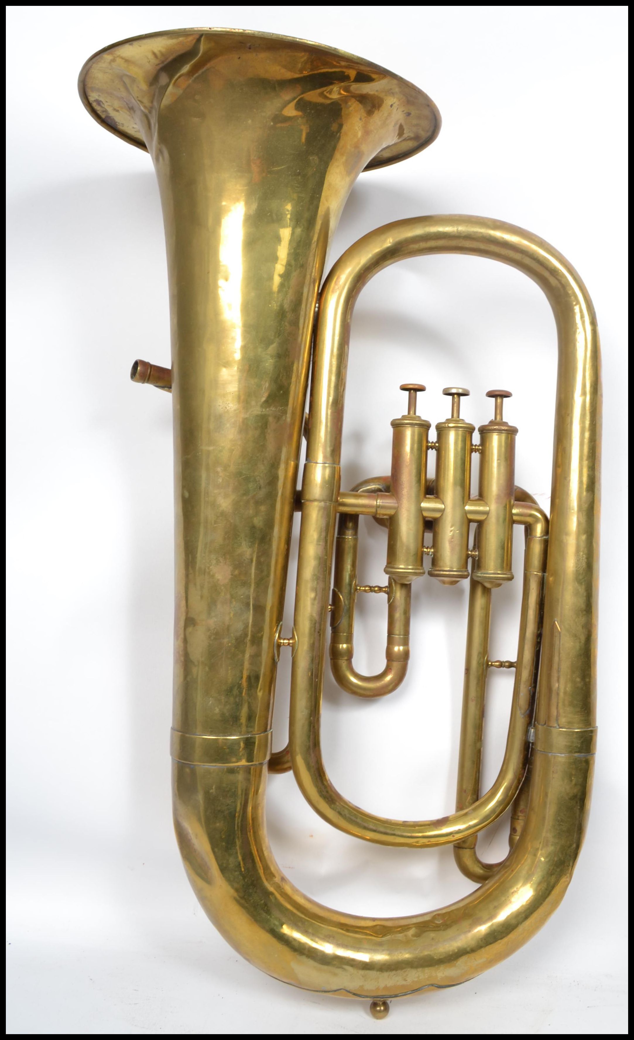 A vintage 20th century brass tuba musical instrument by A Hall Gisborne