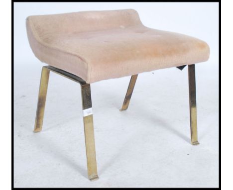 A vintage mid century Ernest Gomme ( G-Plan ) stool being raised on metal bronzed legs and stamped to the base. measures 47 x