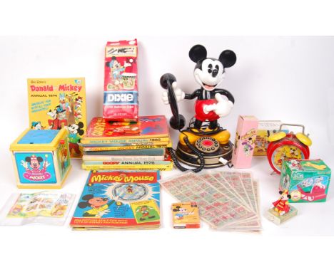 A collection of Disney Mickey Mouse assorted books &amp; toys to include; Mattel Jack- in-a-box, alarm clock, large Micky Mou