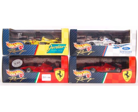 Four Mattel made 1:43 scale Hot Wheels diecast model racing cars to include; 22807 Ferrari F300, 24626 Ferrari F399, 24624 Fo