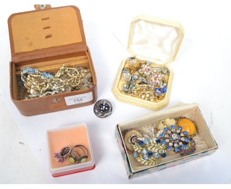 A fantastic collection of vintage 20th century costume dress jewellery to include many pairs of costume dress clips, four sil