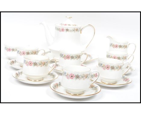 A vintage 20th century Paragon Belinda china tea service consisting of cups, saucers, side plates, creamer jug, sugar bowl, c