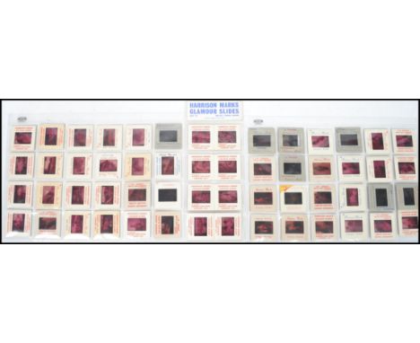 A collection of vintage 20th century Harrison Marks nude erotic glamour 35mm slides all with names and notation to include se