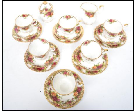 A vintage 20th century Royal Albert Old Country Roses tea service consisting of six cups and saucers, sugar bowl and creamer 