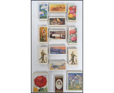 A good collection of cigarette cards&nbsp; to include 14 full sets, approx 600 cards to include sets: Players Zoo Babiers 193