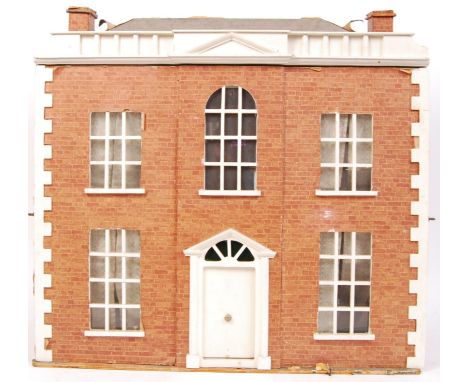A large vintage 20th century Georgian red brick style dolls house / mansion complete with; furniture, light fittings, doors, 