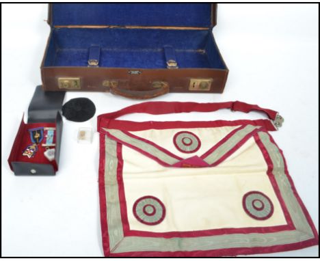 A masonic regalia lot to include two medals one of which is silver with notation for ' Taunton school lodge No 8215 ' on a bl