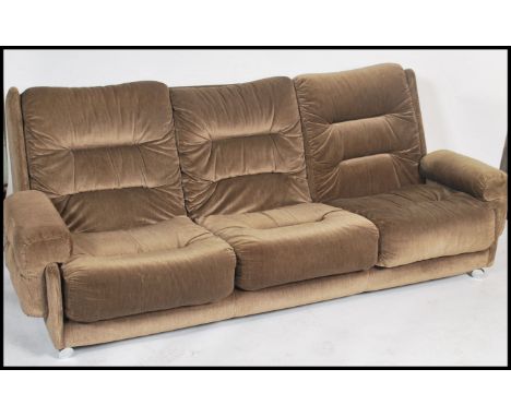 A vintage retro G-Plan 'saddle ' style 3 seat sofa settee in the manner of Kofod Larsen. The sofa  upholstered in the origina