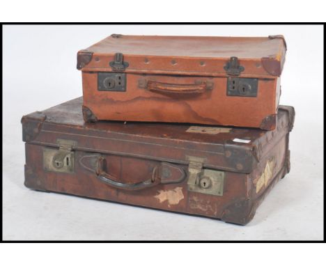 A vintage 20th century full grain leather suitcase with dual brass lock with notation for Cambridge College, Bristol GWR pre 