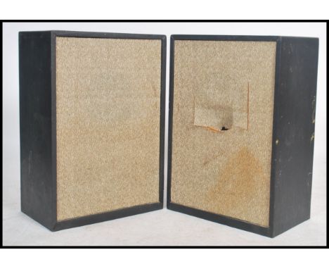 A large pair of vintage 20th century club style speakers in wooden cases with fabric facia's&nbsp;