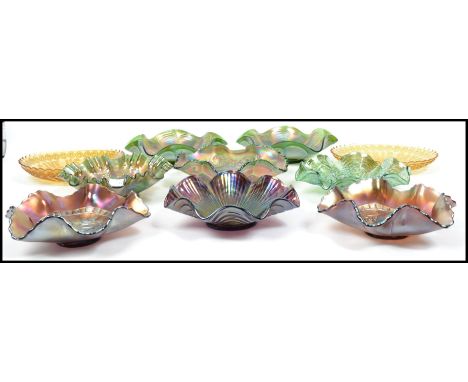 A good collection of vintage 20th century Carnival glass in the green colourway to include several pieces such as Give Us Our