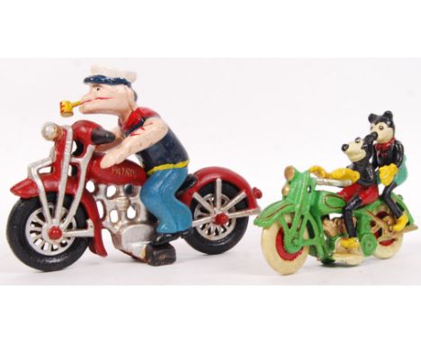 Two 20th century vintage style motorcycles being ridden by Popeye &amp; Mickey Mouse. Large bike measuring 21cm long, smaller