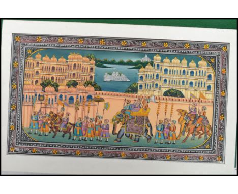 A vintage 20th century Indian Rajasthani art hand made painting on silk of the Royal Maharajah procession depicting Palaces r