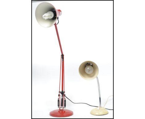 A vintage retro 20th century Herbert Terry 90 anglepoise desk lamp in the red colourway together with a Herbert Terry goose n